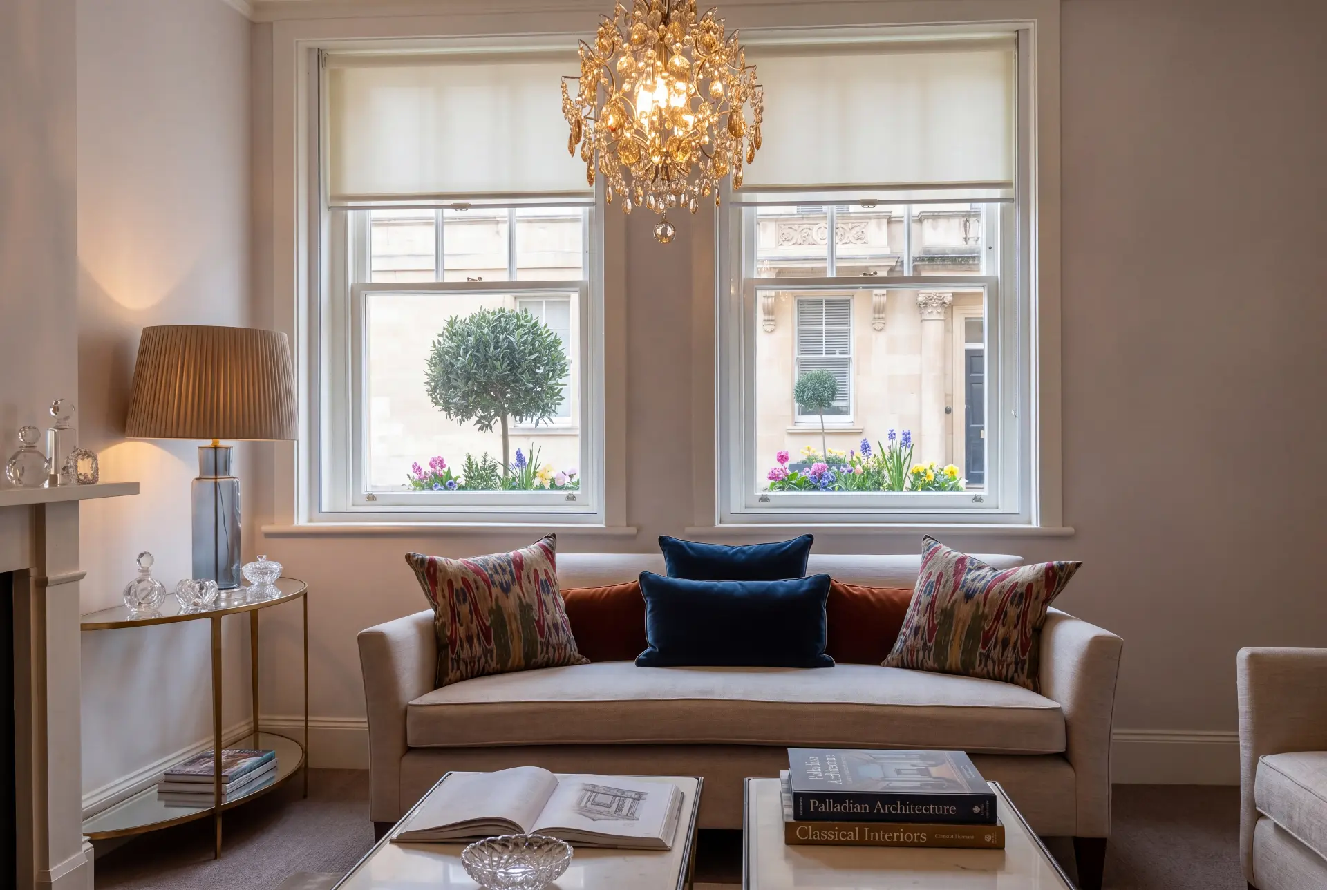 Stucco square drawing room — secondary glazing in Belgravia, London Pair of secondary glazed sash windows in an elegant Belgravia drawing room with chandelier
