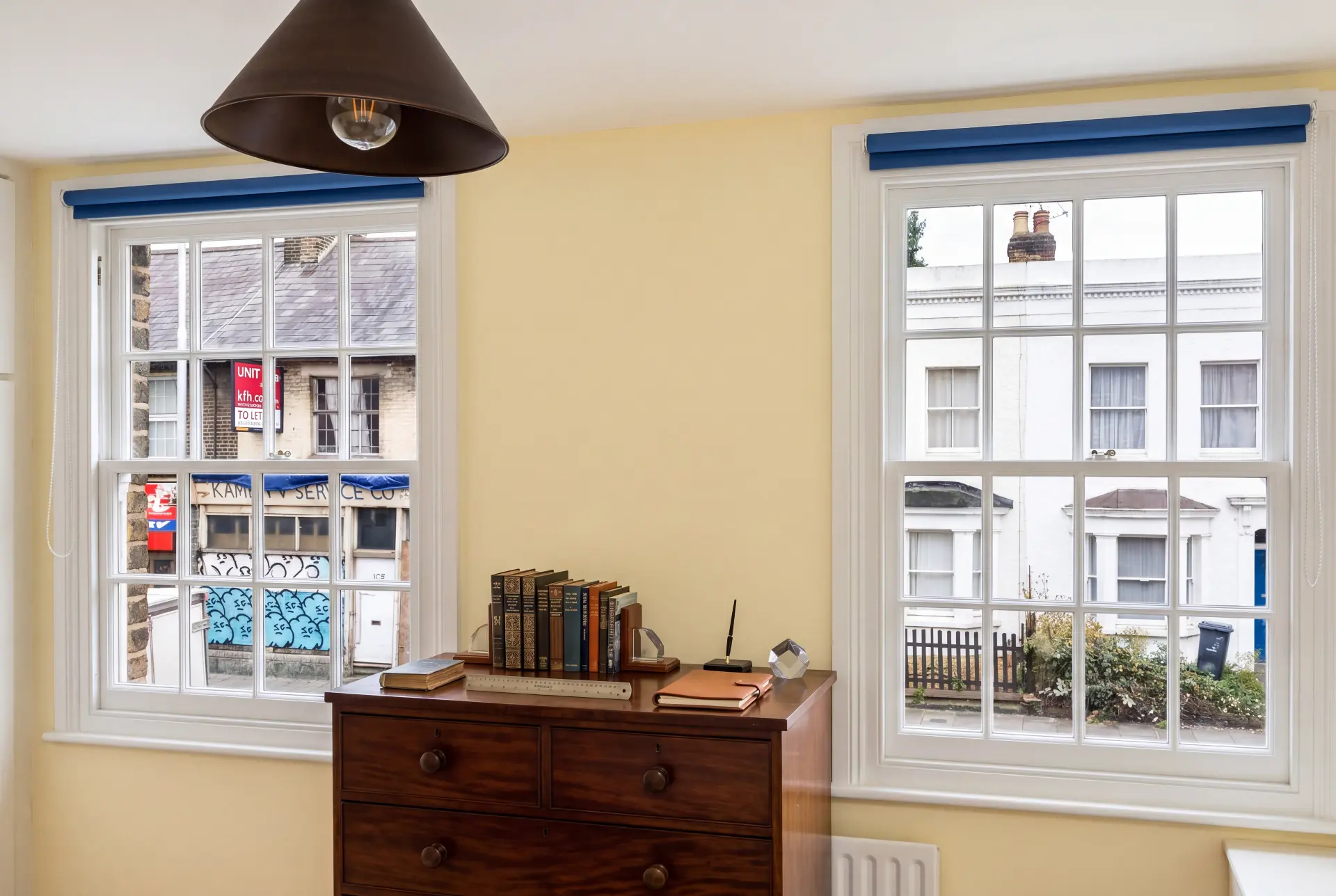 Georgian bar study — secondary glazing in Camden, London Home study with two secondary glazed Georgian bar sash windows and blue blinds