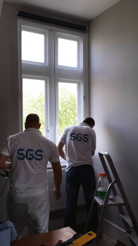 Professional SGS installers team installing acoustic windows