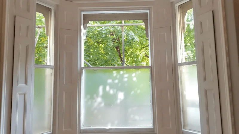Hinged acoustic secondary glazing with full access opening for period homes