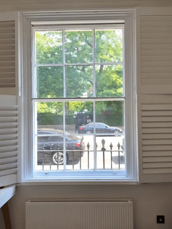 Main road frontage — secondary glazing in Shepherd's Bush, London Secondary glazing installed on a window facing a busy London road