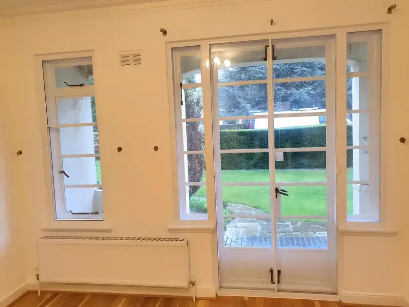 Combination system — secondary glazing in Barnes, London Combination secondary glazing with fixed and sliding sections