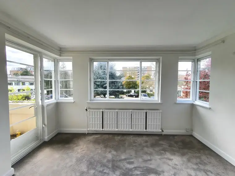 Hinged casement unit — secondary glazing in Ealing, London Hinged secondary glazing unit opened for cleaning access