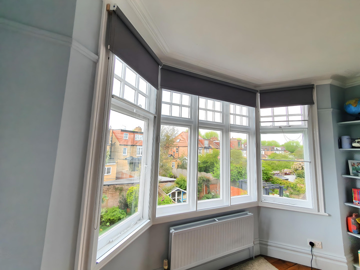 Sash bay window with bespoke secondary glazing panels installed