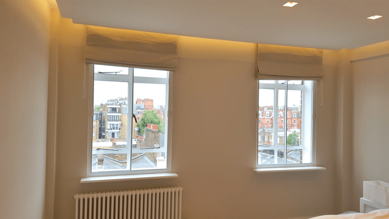 Secondary glazing in a Victorian living room in Highgate with period features preserved